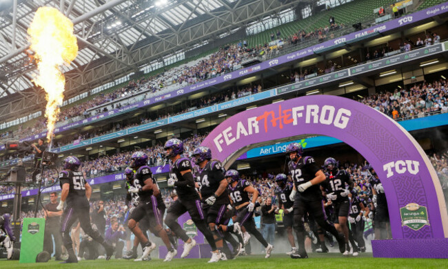 tcu-horned-frogs-players-run-out-onto-the-field