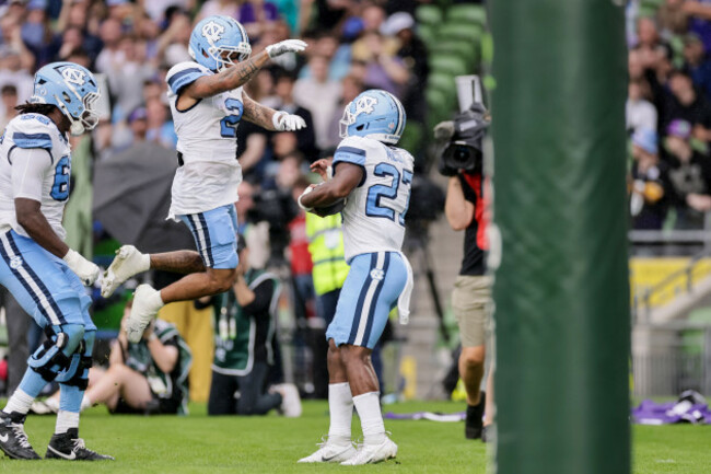 jaylen-mcgill-celebrates-with-teammates-after-scoring-his-sides-first-touchdown-of-the-match
