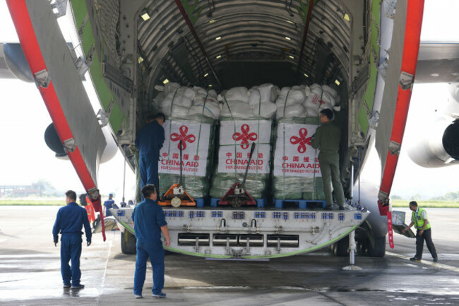 kathmandu-nepal-30th-aug-2026-staff-members-prepare-to-unload-chinese-relief-supplies-at-tribhuvan-international-airport-in-kathmandu-nepal-aug-30-2026-carried-by-two-y-20-transport-planes-c
