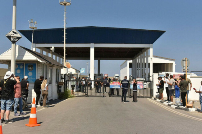 people-gather-outside-the-port-of-kyrenia-in-the-turkish-occupied-northern-part-of-cyprus-sunday-aug-30-2026-after-a-catamaran-style-ferry-overturned-off-the-islands-northern-coast-ap-photo