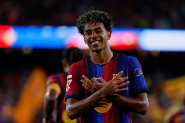 barcelonas-lamine-yamal-celebrates-after-scoring-his-sides-fifth-goal-during-a-spanish-la-liga-soccer-match-between-barcelona-and-rayo-vallecano-in-barcelona-spain-monday-aug-31-2026-ap-photo