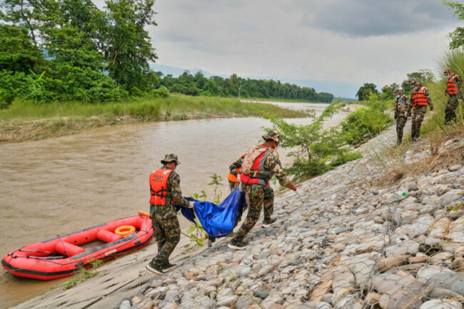 nepalese-army-soldiers-recover-bodies-of-flash-flood-victims-from-a-river-in-chitwan-nepal-monday-aug-31-2026-ap-photodar-yasin