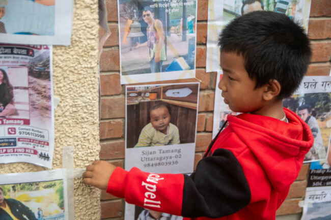 kathmandu-nepal-1st-sep-2026-relatives-of-missing-persons-inspect-notice-boards-displayed-with-photos-and-details-at-tribhuvan-university-teaching-hospital-in-kathmandu-hundreds-remain-unaccounte