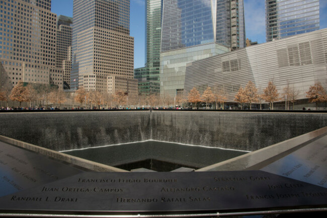 the-national-september-11-memorial-where-the-twin-towers-once-stood-with-the-new-one-world-trade-center-just-to-the-north-image-shot-042014-exact-date-unknown