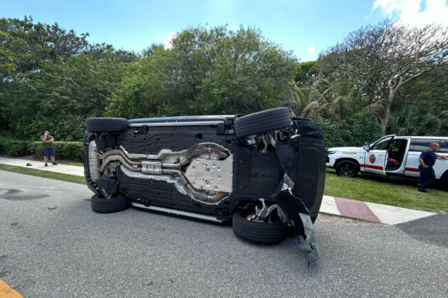 this-photo-provided-by-the-martin-county-sheriffs-office-shows-the-overturned-vehicle-in-a-rollover-crash-which-involved-tiger-woods-in-jupiter-island-fla-on-friday-march-27-2026-martin-county