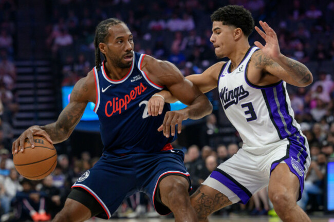 los-angeles-clippers-forward-kawhi-leonard-2-is-guarded-by-sacramento-kings-guard-killian-hayes-3-during-the-first-half-of-an-nba-basketball-game-in-sacramento-calif-sunday-april-5-2026-ap