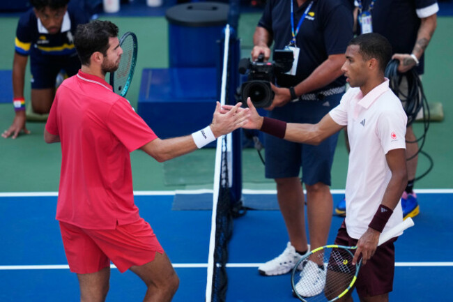 felix-auger-aliassime-of-canada-right-greets-karen-khachanov-of-russia-after-khachanov-won-their-match-during-the-second-round-of-the-u-s-open-tennis-championships-thursday-sept-3-2026-in-ne