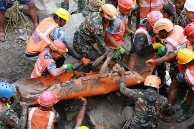in-this-photo-provided-by-the-nepal-army-soldiers-rescue-a-worker-alive-from-a-tunnel-during-an-ongoing-operation-at-the-trishuli-3a-hydropower-project-in-nepals-rasuwa-district-friday-sept-4-20