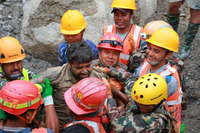 in-this-photo-provided-by-the-nepal-army-soldiers-rescue-a-worker-alive-from-a-tunnel-during-an-ongoing-operation-at-the-trishuli-3a-hydropower-project-in-nepals-rasuwa-district-friday-sept-4-20