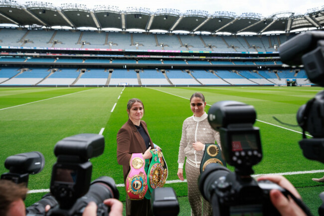 katie-taylor-and-flora-pili-face-off-pitch-side-at-croke-park