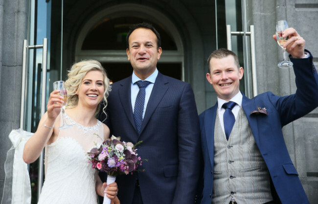 taoiseach-leo-varadkar-greets-newlyweds-ian-and-eleanor-walsh-as-they-arrive-at-hotel-minella-clonmel-where-the-fine-gael-think-in-was-taking-place-ahead-of-the-resumption-of-the-dail-next-week
