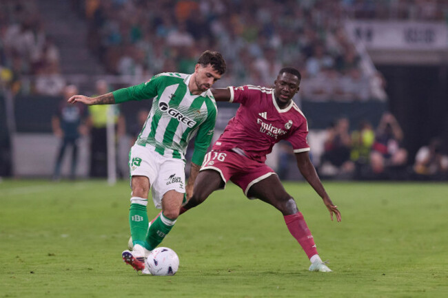troy-parrott-of-real-betis-and-ibrahima-konate-torres-of-real-madrid-during-laliga-ea-sports-match-between-real-betis-v-real-madrid-played-at-la-cartuja-stadium-seville-on-september-4-2026-in-spain