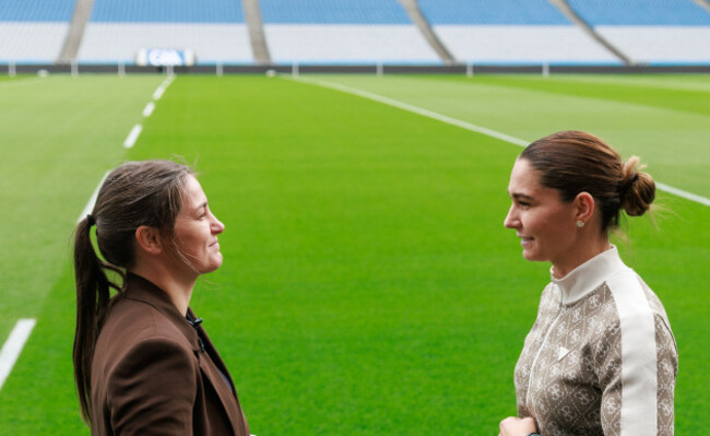 katie-taylor-and-flora-pili-face-off-pitch-side-at-croke-park