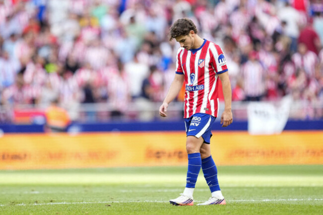 ipa88228390-julian-alvarez-of-atletico-de-madrid-leaves-the-pitch-after-the-match-as-his-own-fans-boo-him-over-his-desire-to-leave-the-club-during-the-transfer-window-after-the-spanish-championship