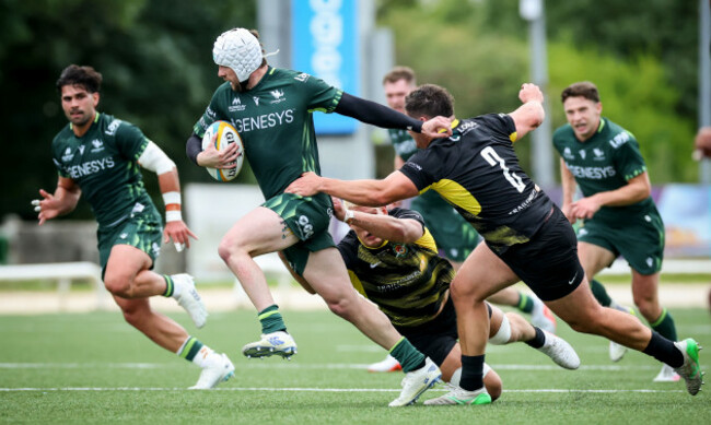 mack-hansen-is-tackled-by-mike-willemse