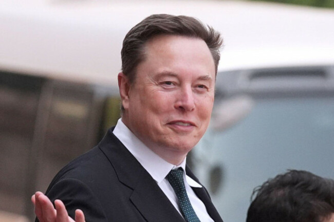 file-elon-musk-departs-after-a-welcome-ceremony-with-president-donald-trump-and-chinas-president-xi-jinping-at-the-great-hall-of-the-people-may-14-2026-in-beijing-ap-photomark-schiefelbein-f