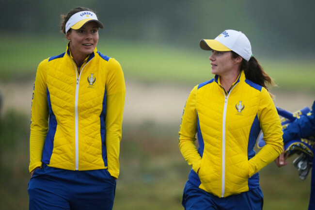 esther-henseleit-left-of-europe-and-teammate-leona-maguire-walk-down-the-second-fairway-during-the-solheim-cup-at-the-bernardus-golf-course-in-den-bosch-netherlands-saturday-sept-12-2026-ap-p