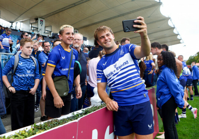 hugo-mclaughlin-takes-a-selfie-with-fans-after-the-game