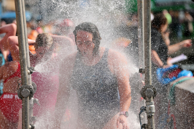 a-competitor-washes-down-after-the-race