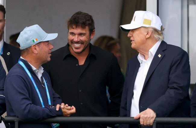 brooks-koepka-and-donlad-trump-watching-over-the-eighteenth