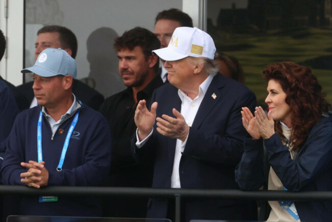 us-president-donald-trump-2nd-right-applauds-rory-mcilroy-as-he-finishes-his-round-as-he-watches-the-irish-open-at-trump-international-golf-links-hotel-in-doonbeg-co-clare-during-his-trip-to-the