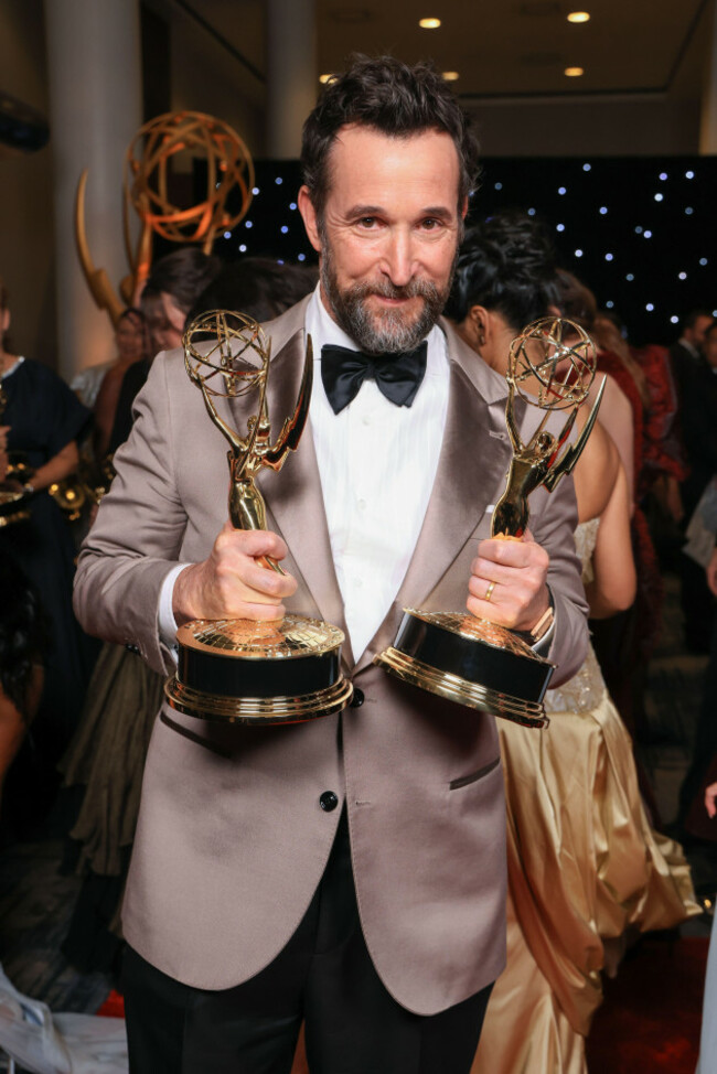 noah-wyle-picks-up-the-official-emmy-statuette-for-outstanding-lead-actor-in-a-drama-series-and-outstanding-drama-series-for-the-pitt-during-the-television-academys-78th-emmy-awards-telecast-at-the