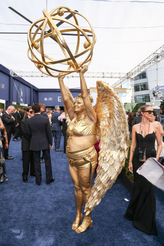 meg-stalter-walks-the-red-carpet-at-the-television-academys-78th-emmy-awards-telecast-at-the-peacock-theater-at-l-a-live-on-monday-sept-14-2026-in-los-angeles-photo-by-mark-von-holdeninvision