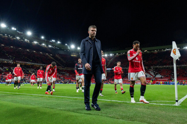 manchester-uk-16th-sep-2026-manchester-united-head-coach-michael-carrick-walks-off-the-pitch-after-losing-2-3-dejected-with-manchester-united-midfielder-bruno-fernandes-8-manchester-united-forwa