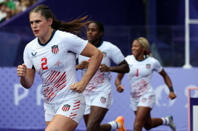 paris-france-30th-july-2024-us-ilona-maher-and-teammates-enter-the-stadium-at-the-start-of-the-usa-vs-new-zealand-womens-rugby-sevens-at-the-2024-summer-olympics-competition-at-the-stade-de-franc