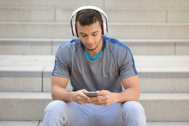 listening-to-music-young-latin-man-with-headphones