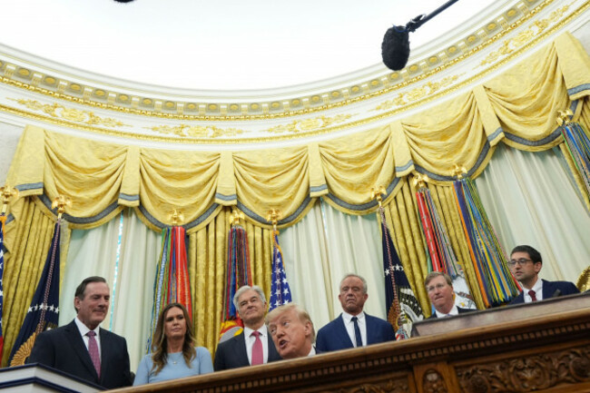 president-donald-trump-speaks-as-south-dakota-gov-larry-rhoden-from-left-arkansas-gov-sarah-huckabee-sanders-mehmet-oz-administrator-of-the-centers-for-medicare-medicaid-services-health-and-h