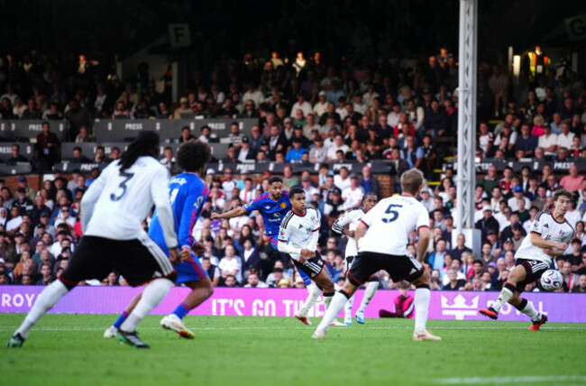 manchester-uniteds-matheus-cunha-scores-their-sides-first-goal-of-the-game-during-the-premier-league-match-at-craven-cottage-london-picture-date-sunday-september-20-2026