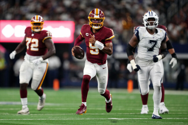 washington-commanders-quarterback-jayden-daniels-5-runs-against-the-dallas-cowboys-in-the-first-half-during-an-nfl-football-game-in-arlington-texas-sunday-sept-20-2026-ap-phototony-gutierrez