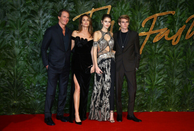 file-businessman-rande-gerber-from-left-models-cindy-crawford-kaia-gerber-and-presley-walker-gerber-pose-in-central-london-monday-dec-10-2018-photo-by-joel-c-ryaninvisionap-file