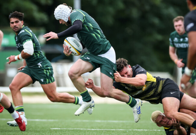 mack-hansen-is-tackled-by-mike-willemse