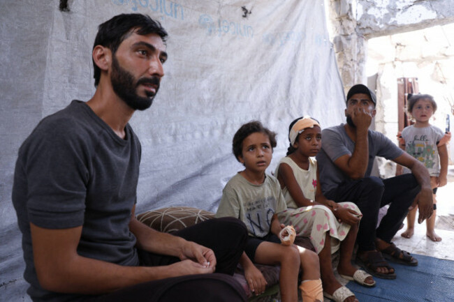 palestinian-children-survive-gaza-building-collapse-that-killed-family-members-palestinian-children-abdulrahman-azzam-6-and-his-sister-ferial-10-sit-inside-a-tent-with-their-grandmother-west-of-ga