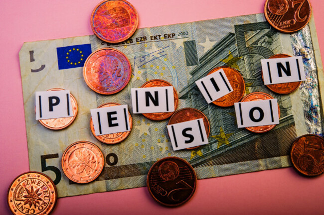 inscription-is-a-pension-on-the-background-of-coins-of-euro-cents-and-an-old-five-euro-note