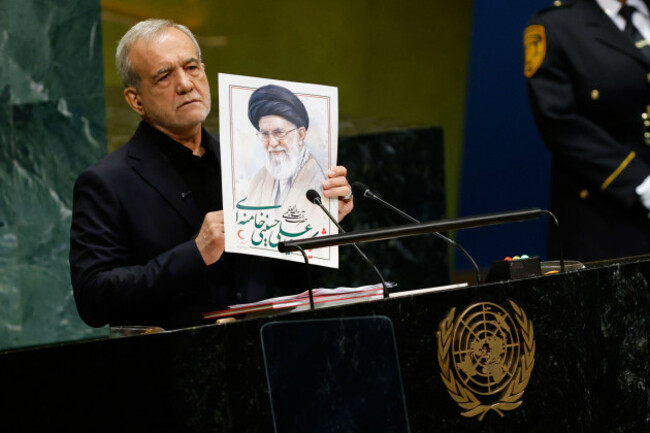 irans-president-masoud-pezeshkian-holds-an-image-of-late-iranian-supreme-leader-ayatollah-ali-khamenei-during-the-81st-session-of-the-united-nations-general-assembly-at-united-nations-headquarters-w