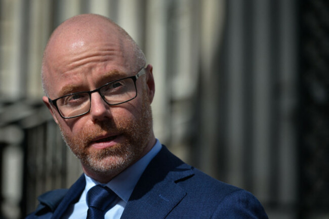 stephen-donnelly-minister-for-health-speaks-to-the-media-outside-government-buildings-in-dublin-before-the-cabinet-meeting-on-tuesday-30-march-2021-in-dublin-ireland-photo-by-artur-widaknurp