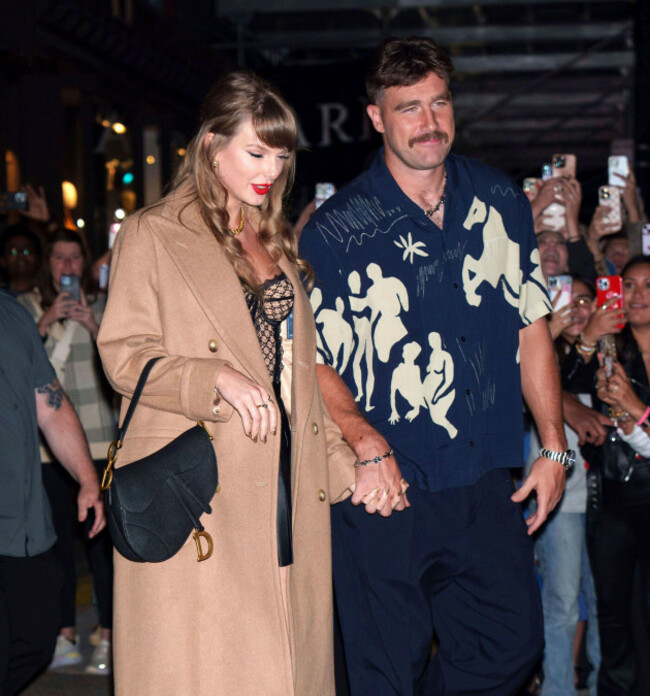photo-by-zzxnystar-maxipx-2025-82625-taylor-swift-and-travis-kelce-are-engaged-star-max-file-photo-101124-taylor-swift-and-travis-kelce-are-seen-on-october-11-2024-outside-the-corner-store