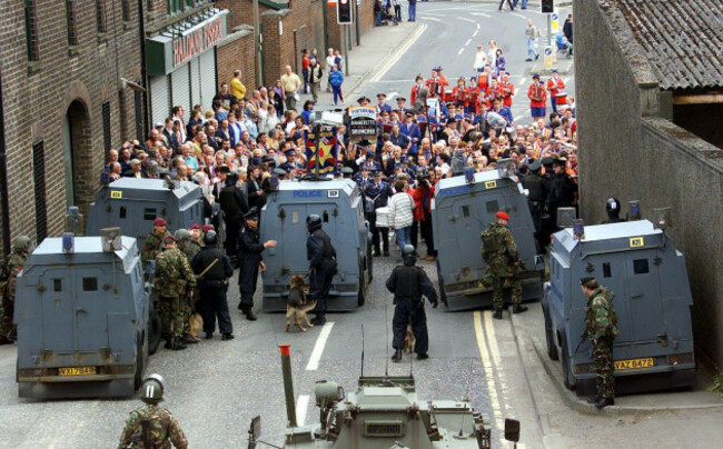 security-forces-seal-off-the-bottom-of-the-garvaghy-road-in-portadown-to-stop-members-of-the-portadown-orangemen-from-entering-a-nationalist-area-they-were-marching-to-mark-the-1000th-day-of-the-dr