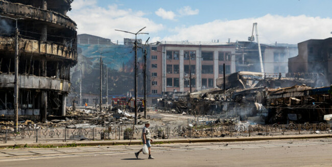 the-destroyed-kvadrat-shopping-mall-near-lukianivska-metro-station-in-kyiv-is-seen-smoldering-following-a-massive-russian-missile-strike-targeting-civilian-infrastructure-russia-launched-a-massive-co