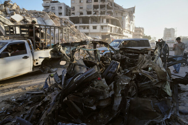 palestinians-inspect-the-wreckage-of-a-car-after-it-was-hit-by-an-israeli-strike-in-gaza-city-sunday-sept-27-2026-ap-photojehad-alshrafi