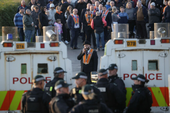 editors-note-the-faces-of-the-officers-from-the-psni-have-been-pixelated-by-the-pa-picture-desk-to-protect-their-identities-orange-men-gather-near-drumcree-church-as-police-form-a-barricade-to-preve
