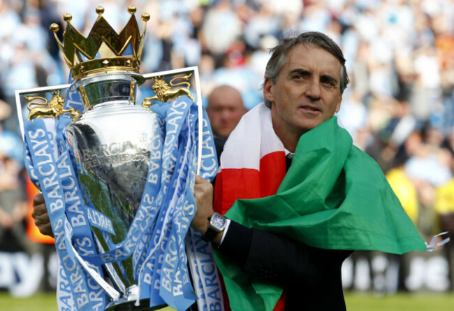 file-photo-dated-13-05-2012-of-manchester-city-manager-roberto-mancini-celebrates-with-the-trophy-roberto-mancinis-city-clinched-the-title-but-only-at-the-end-of-a-roller-coaster-season-issue-date