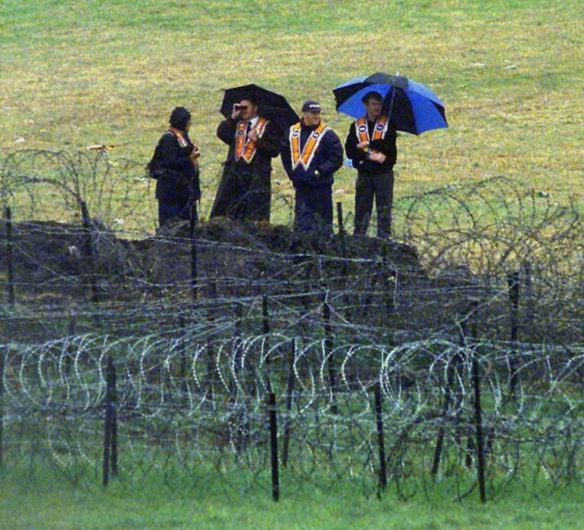 file-photo-dated-120798-of-orangemen-overlooking-the-defences-at-drumcree-the-murders-of-three-young-children-in-ballymoney-were-recorded-as-having-changed-the-mood-in-northern-ireland-following