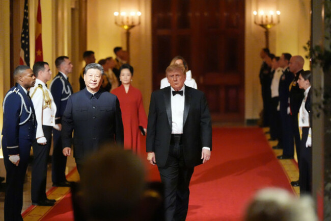 president-donald-trump-arrives-with-chinas-president-xi-jinping-and-first-lady-melania-trump-and-peng-liyuan-during-a-state-dinner-for-chinas-president-xi-jinping-in-the-east-room-of-the-white-house