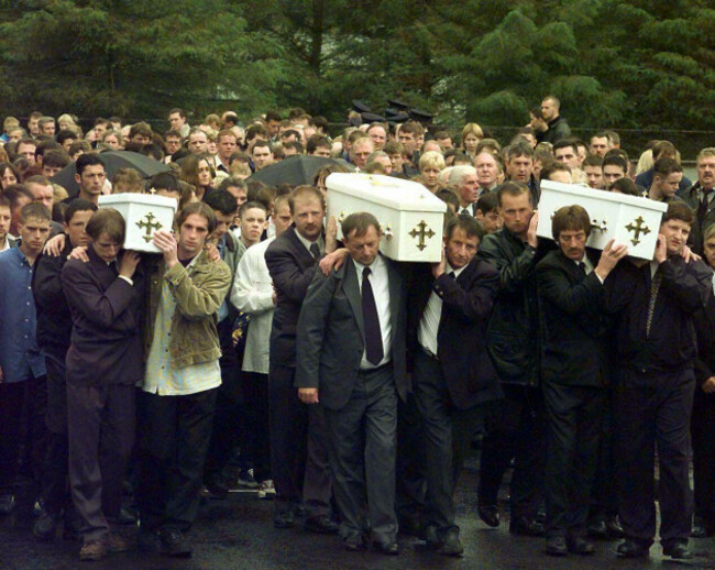 file-photo-dated-140798-of-the-three-coffins-of-brothers-richard-mark-jason-quinn-who-were-killed-in-a-sectarian-arson-attack-being-carried-by-family-and-mourners-to-rasharkin-church-for-burial