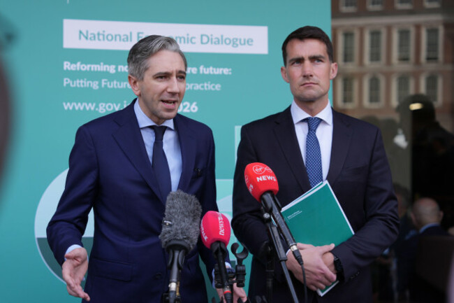 tanaiste-simon-harris-left-and-public-expenditure-minister-jack-chambers-during-a-media-doorstep-as-he-arrives-at-the-national-economic-dialogue-at-dublin-castle-picture-date-monday-june-15-2026