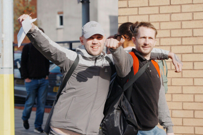 people-celebrate-as-they-leave-hmp-bristol-in-horfield-north-bristol-around-700-prisoners-will-walk-free-from-jail-in-the-first-wave-of-the-controversially-expanded-programme-to-free-up-spaces-in-pr